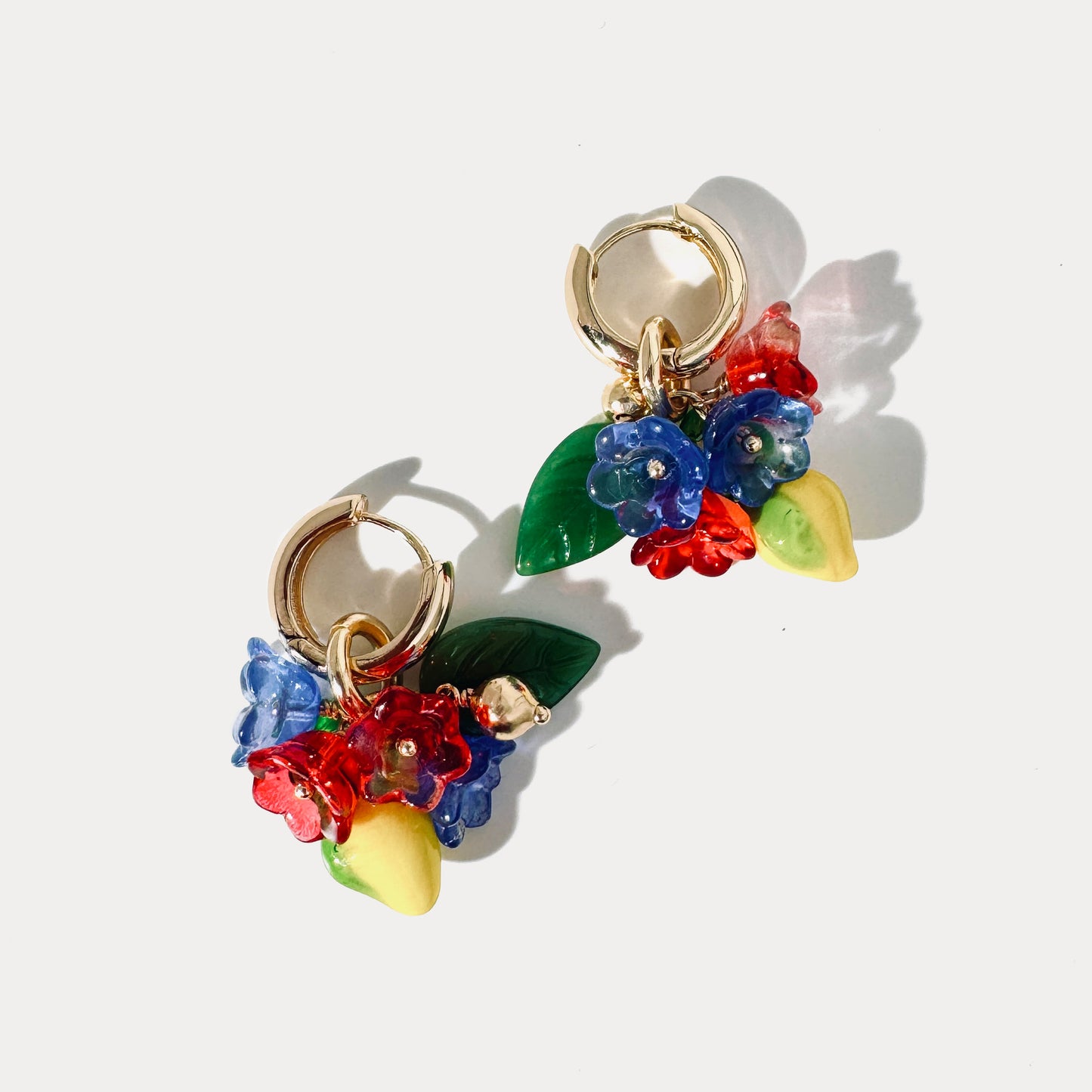 18K gold-plated earrings with handcrafted glass lemons and flowers, part of the Positano jewelry set